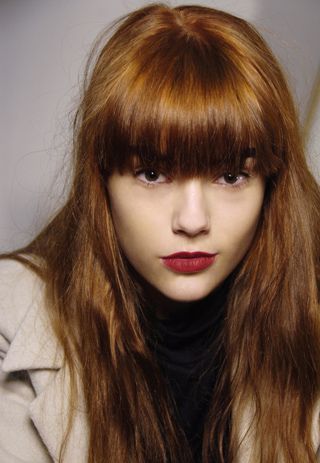 Flaunt This Fall: Femme Fatale Redefined With Dark Lips and Red Hair