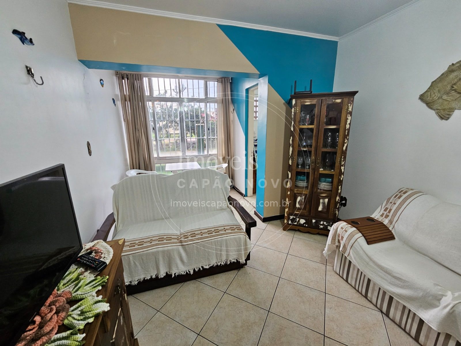 Apartamento Térreo Mobiliado com Sacada Fechada Frente Norte no Centro - Capão Novo - Foto 3