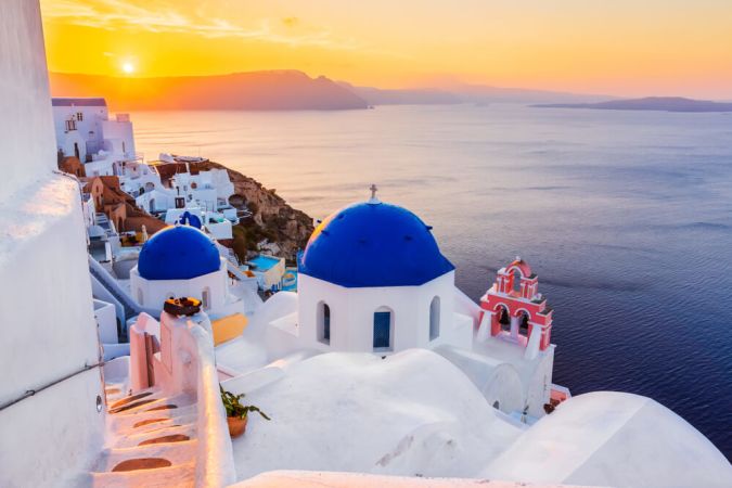 Picture shows a beautiful sunset over Santorini.