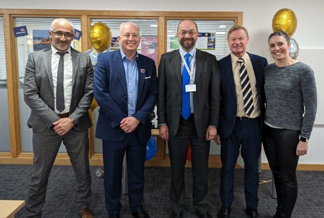 MP Sir James Duddridge (centre) visiting the InsureandGo offices, posing with some of our team. (L-R) Operations Manager Oliver Taylor, CEO Chris Rolland, Head of Corporate Affairs Garry Nelson and Head Of Communications Letitia Smith.