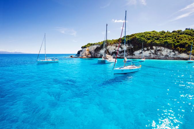 Picture shows clear, azure seas of the idyllic coast of Corfu, Greece.