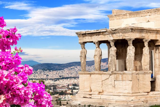 The picture shoes a stunning view of ruins in Athens, Greece. June is a great time to visit this amazing city.