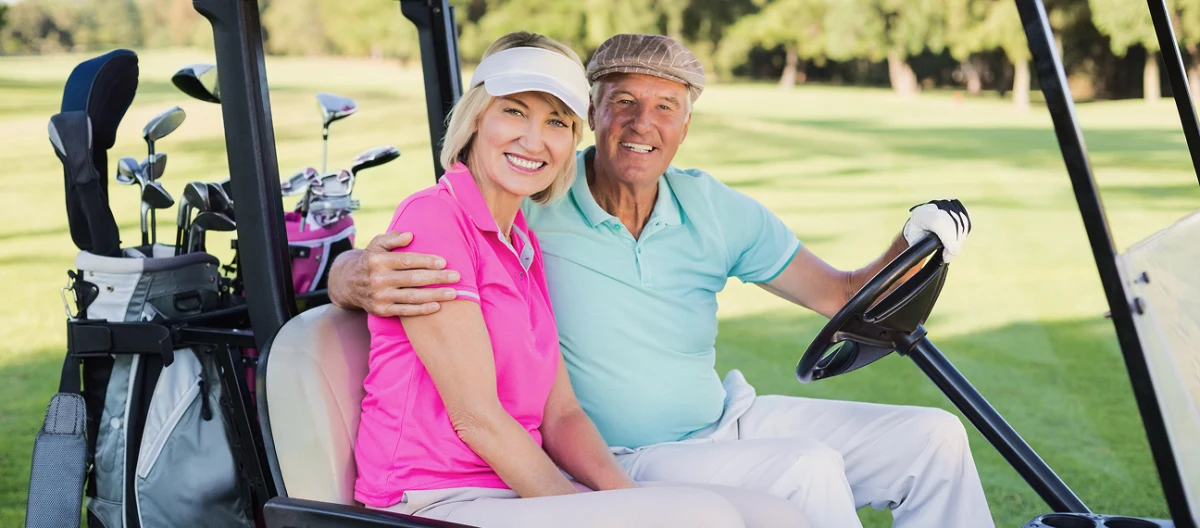 Golfer on a course abroad with golf travel insurance