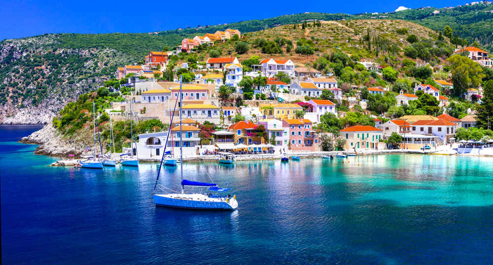 Picture shows a vibrant costal village on Kefalonia.