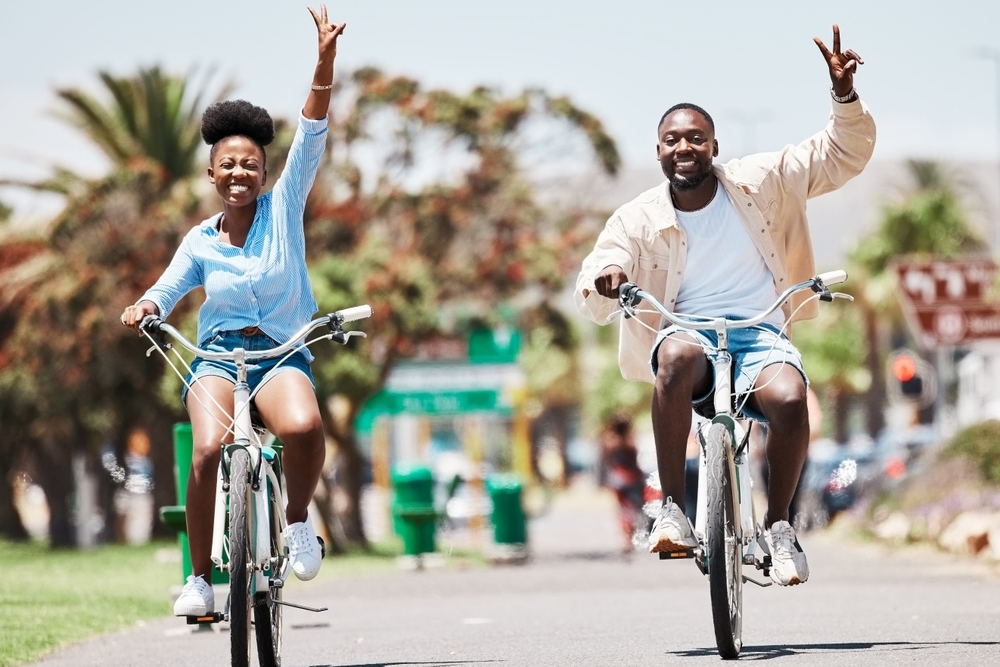 Couple cycling on holiday, showing that sustainable travel can be for everyone.