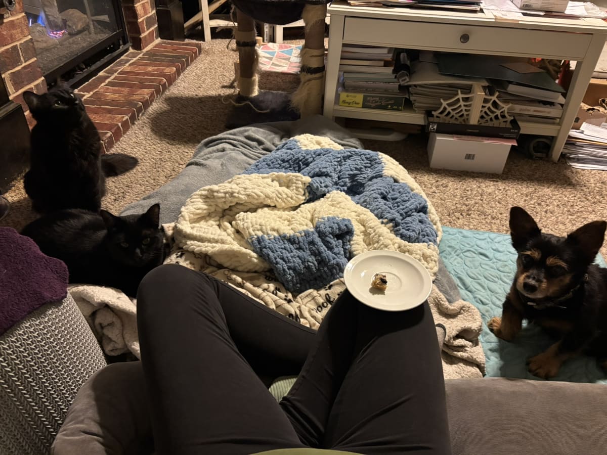 Still waiting for mom to share some of her treat with me