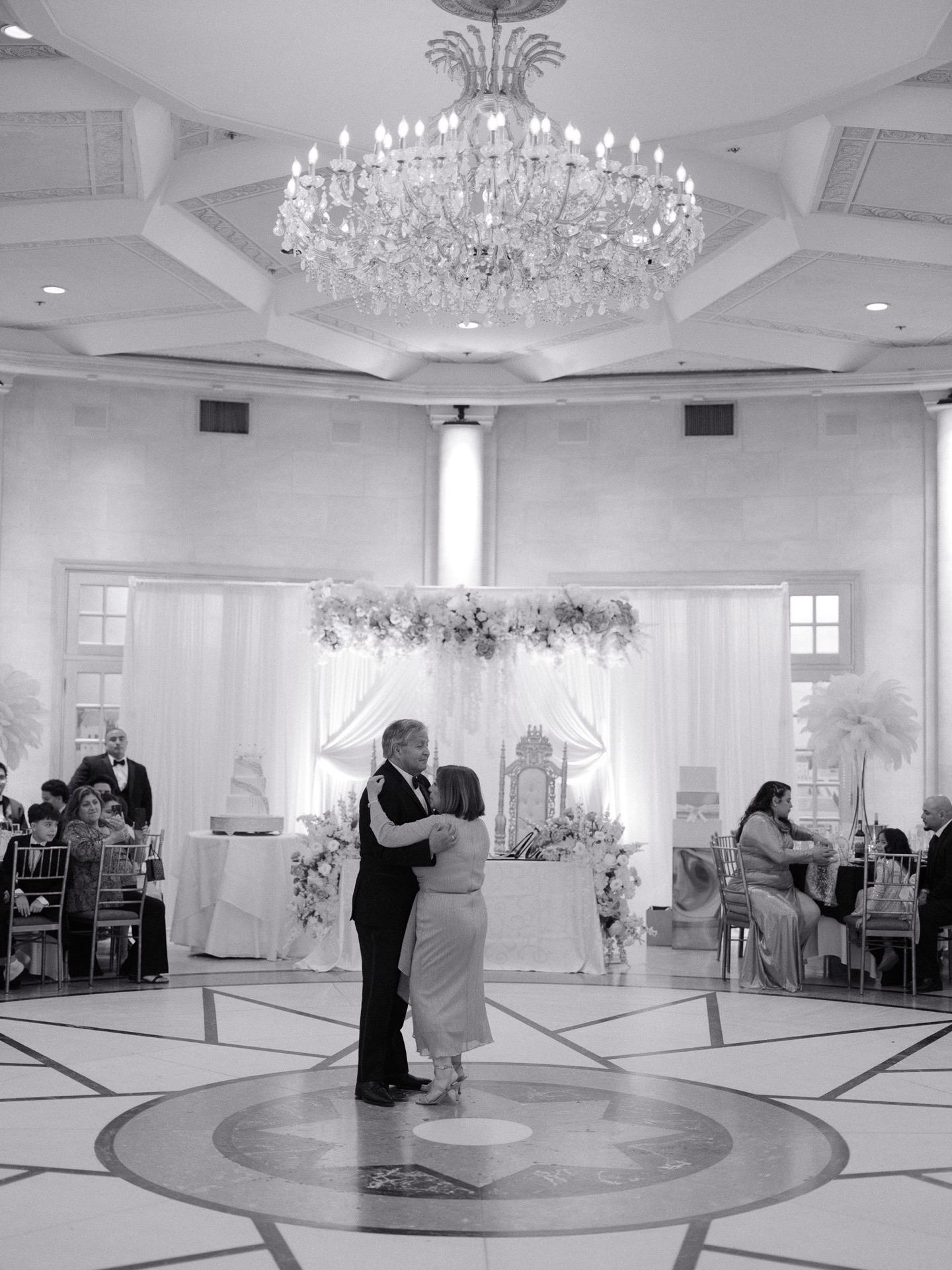 Beneath the chandelier