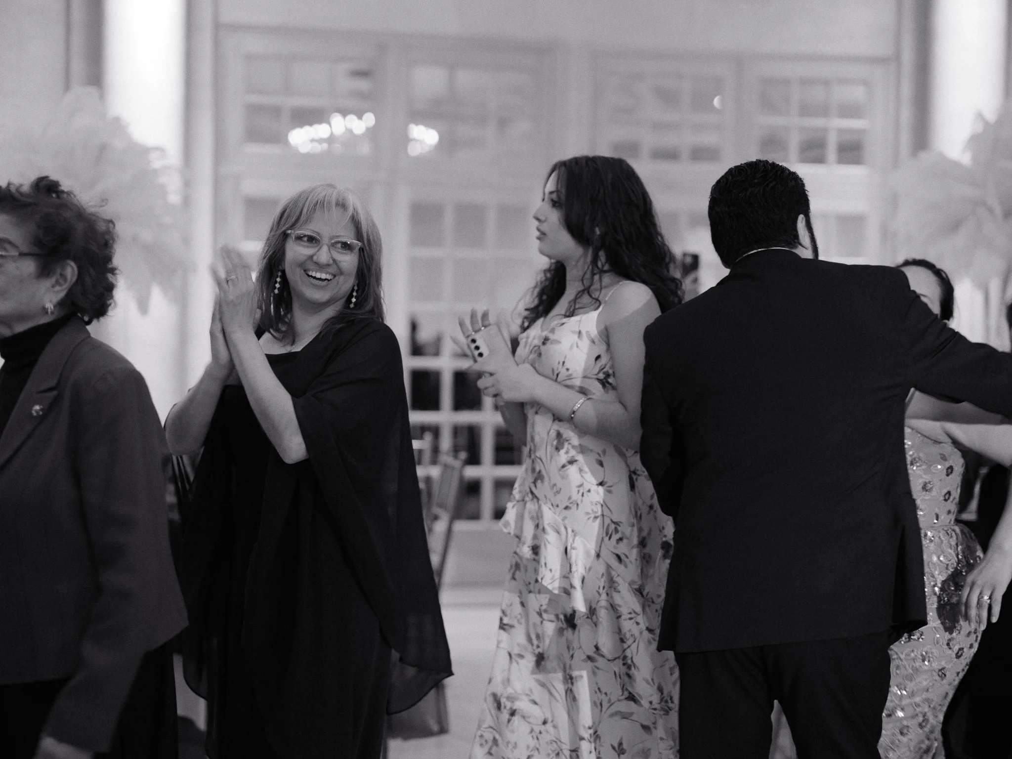Guests laughing and dancing on the dance floor