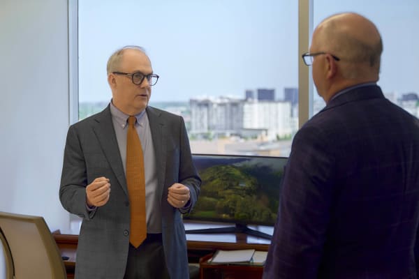 Attorney giving speech presentation NYC law firm office lifestyle photography