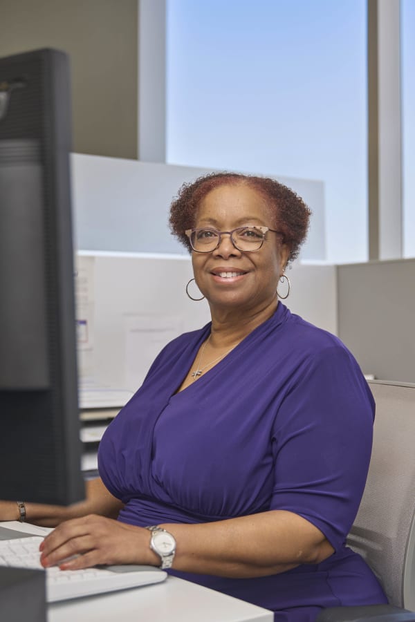 Professional woman standing portrait NYC law firm office lifestyle photography
