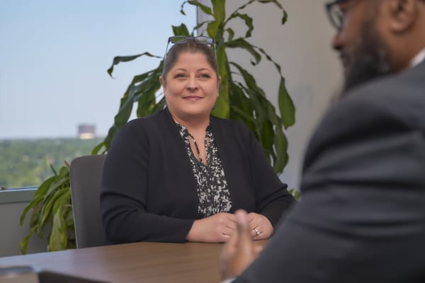 Professional woman smiling portrait NYC law firm office lifestyle photography