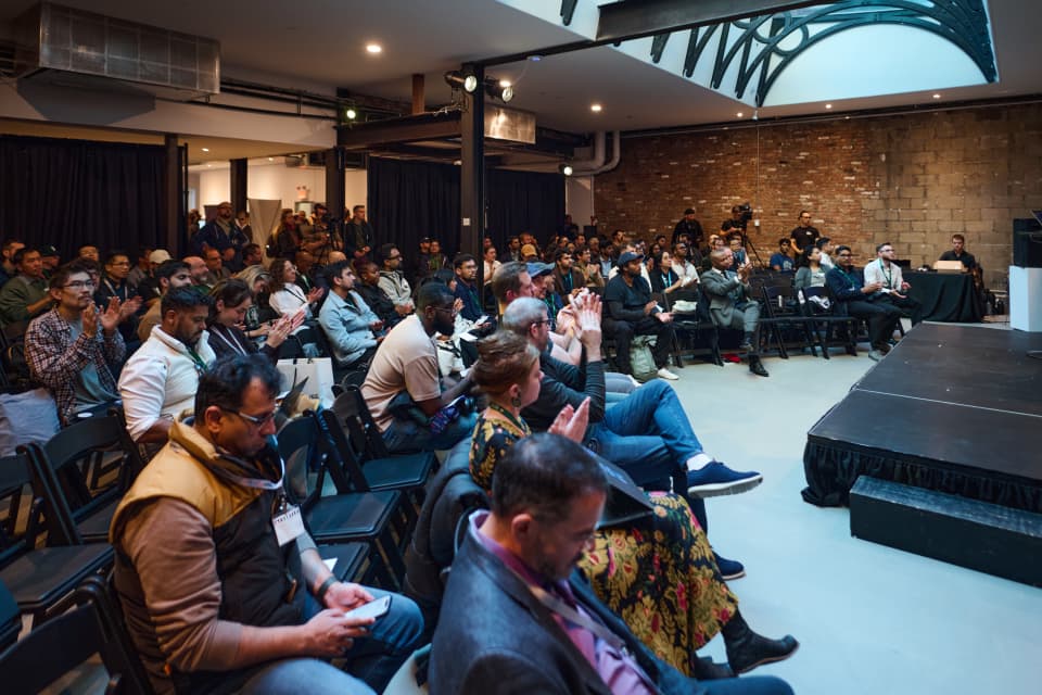 Attendees seated for a keynote at a New York tech conference