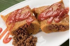 Pasteles en hoja con relleno de carne de res.