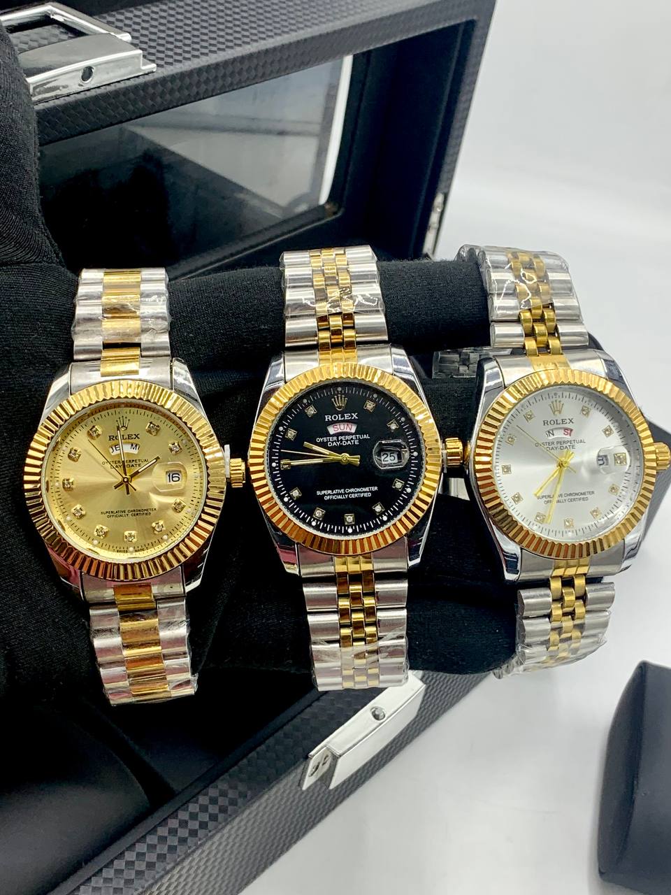 Rolex Day-Date (two-tone style with black dial and fluted bezel) 1