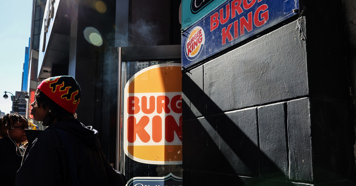 People outside a Burger King restaurant storefront — source photo placeholder pending sketch generation