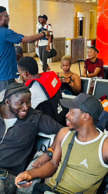 Friends chatting and laughing before their trip