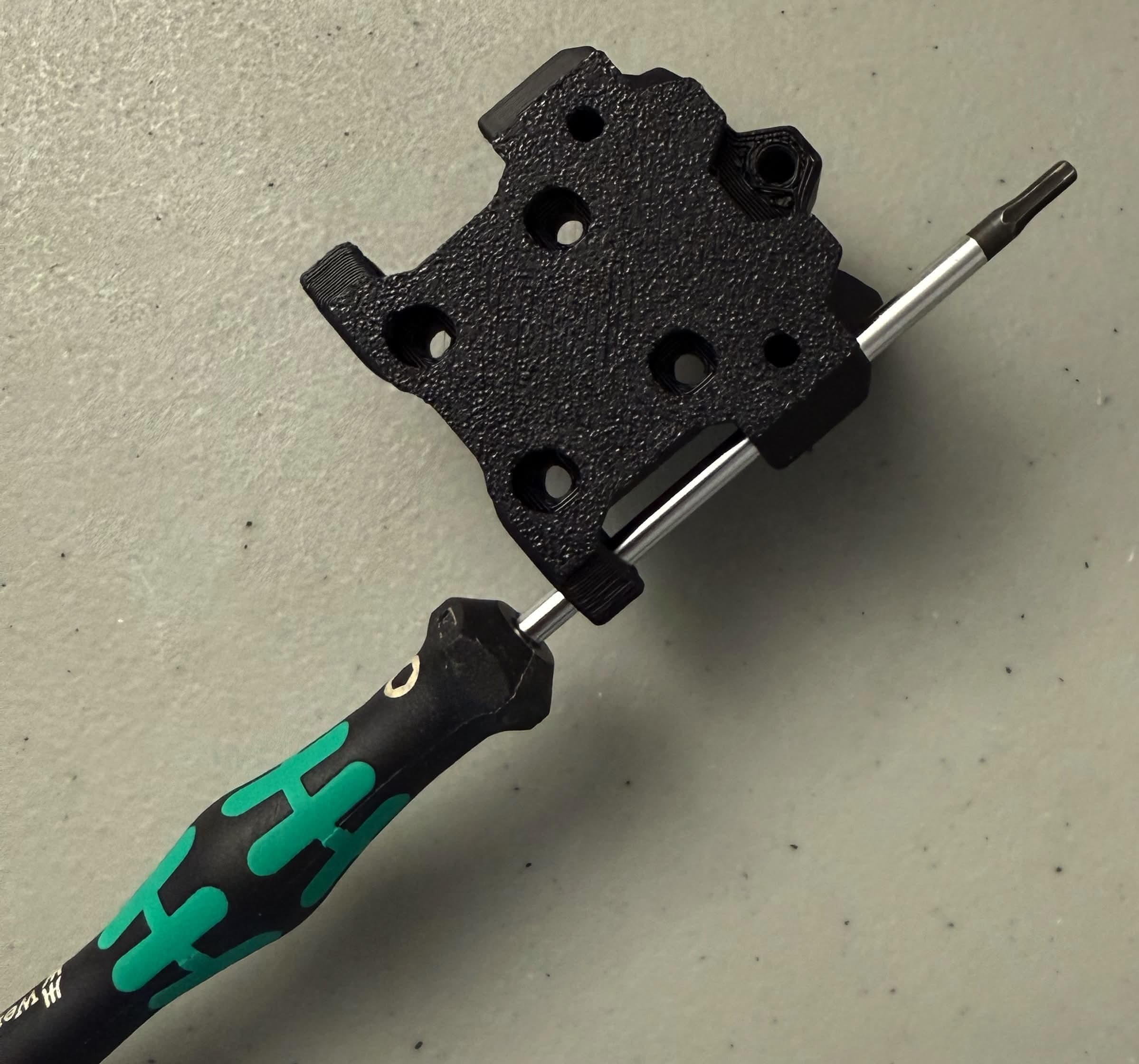 Reaming the hole with a screwdriver