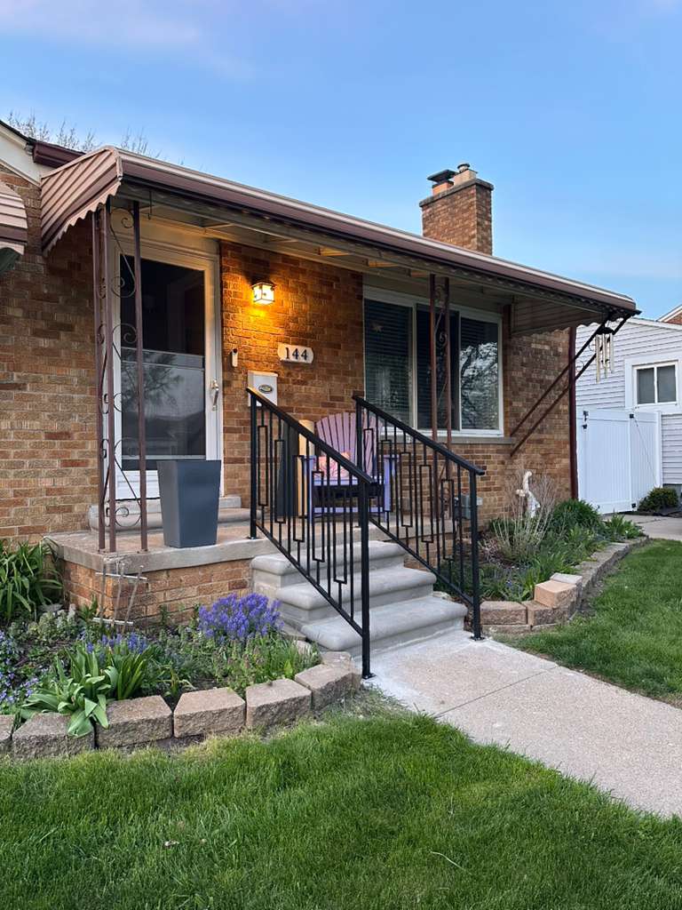 Custom exterior steel stair railing designed and installed in Warren, MI