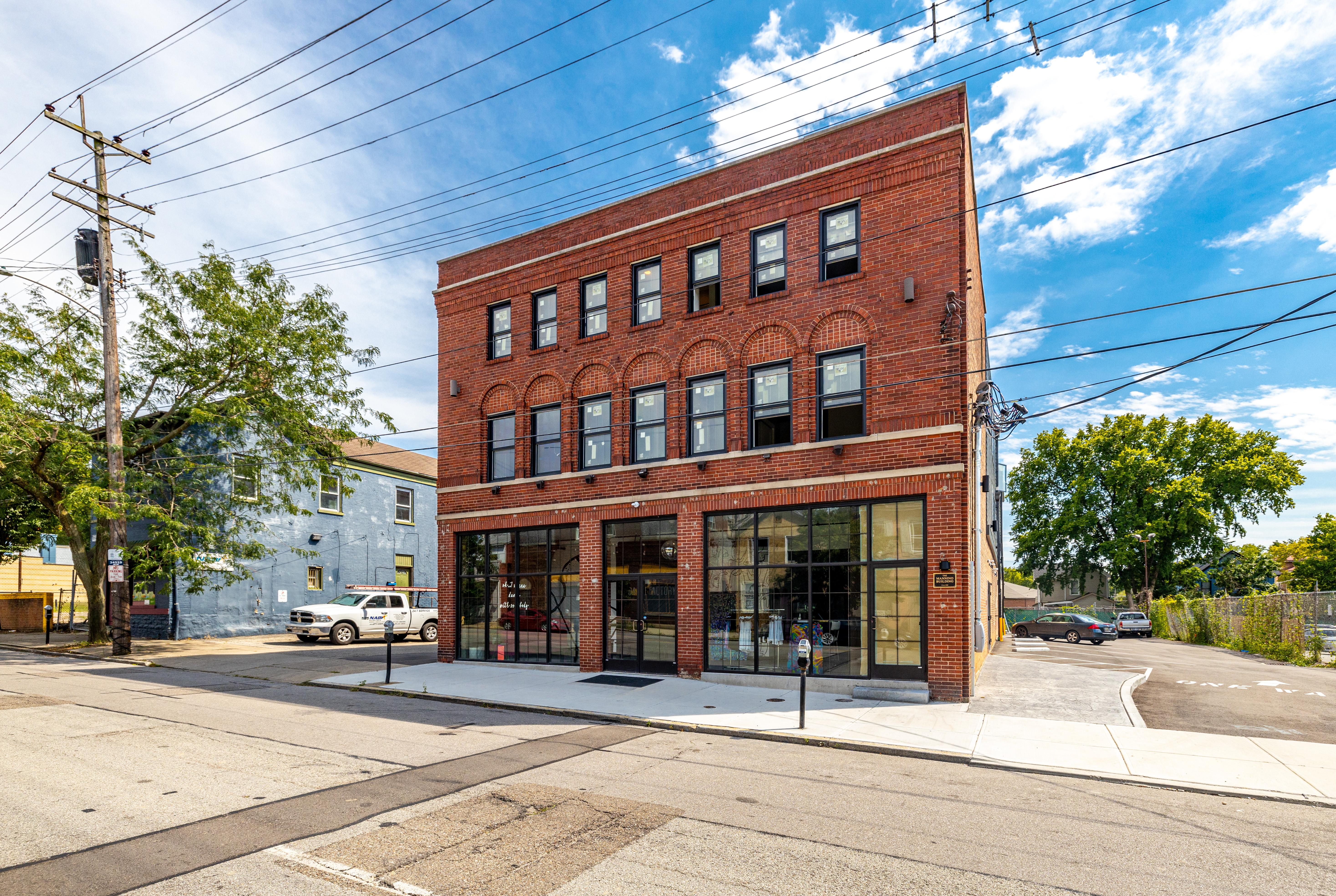 The Mannino Building historic brick apartments exterior — 6011 Madison Road Madisonville Cincinnati