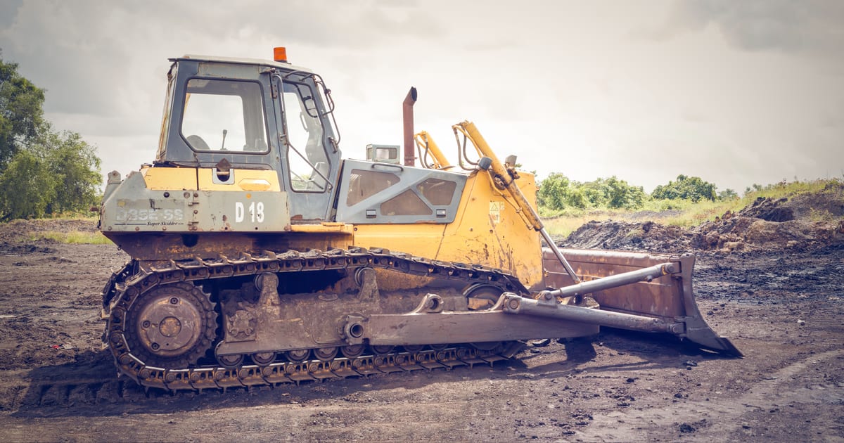 Heavy construction equipment on a job site in Canada
