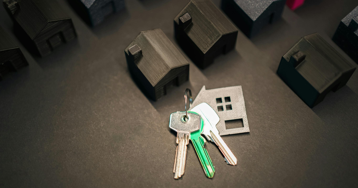House keys and mortgage documents on a table