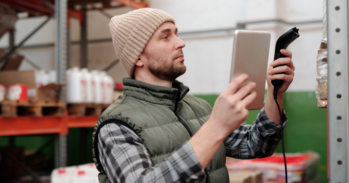 Canadian small business owner checking inventory, the kind of operating business alternative lenders assess from bank statements