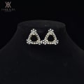 Triangle Shaped Earrings With a Flower On All Corners 2
