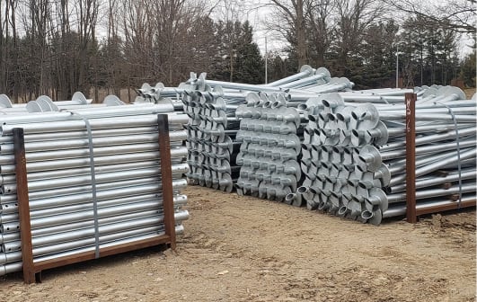 Custom fabricated helical pile components and materials