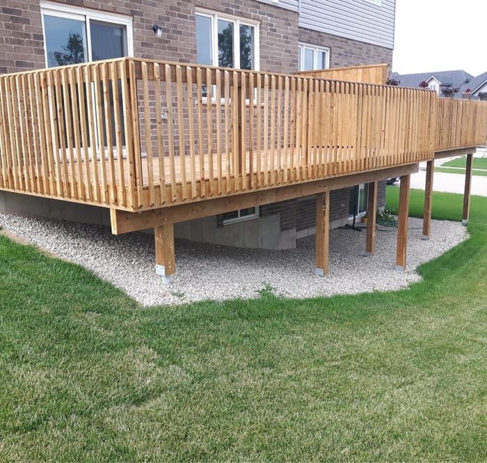 Completed deck supported by helical pile foundation