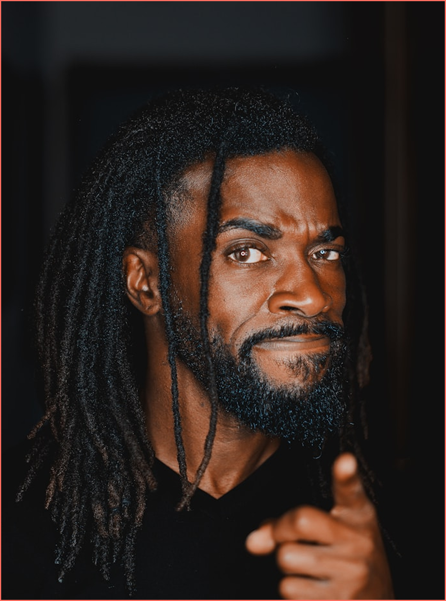 Creative professional with dreadlocks