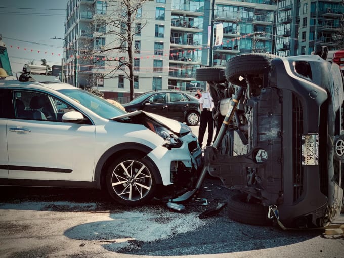 Major car accident scene showing the importance of comprehensive rental car insurance coverage