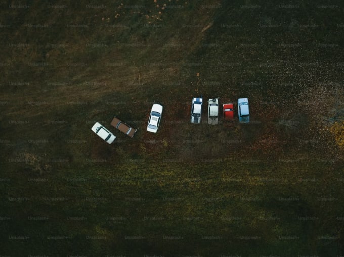 Aerial view of shared car fleet representing sustainable ESG car sharing