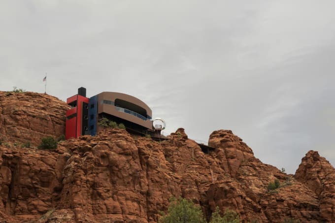 Modern architecture perched on Sedona red rock cliffs