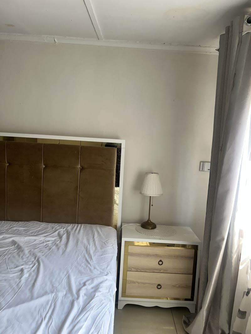 Luxury bed set with side tables and dressing table attached with a mirror