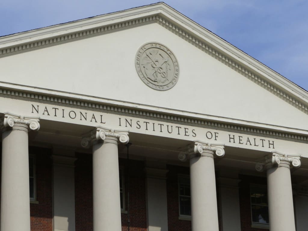 The administrative building of the National Institutes of Health is shown in Bethesda, Md., Monday, Aug. 17, 2009. (AP Photo/J. Scott Applewhite)