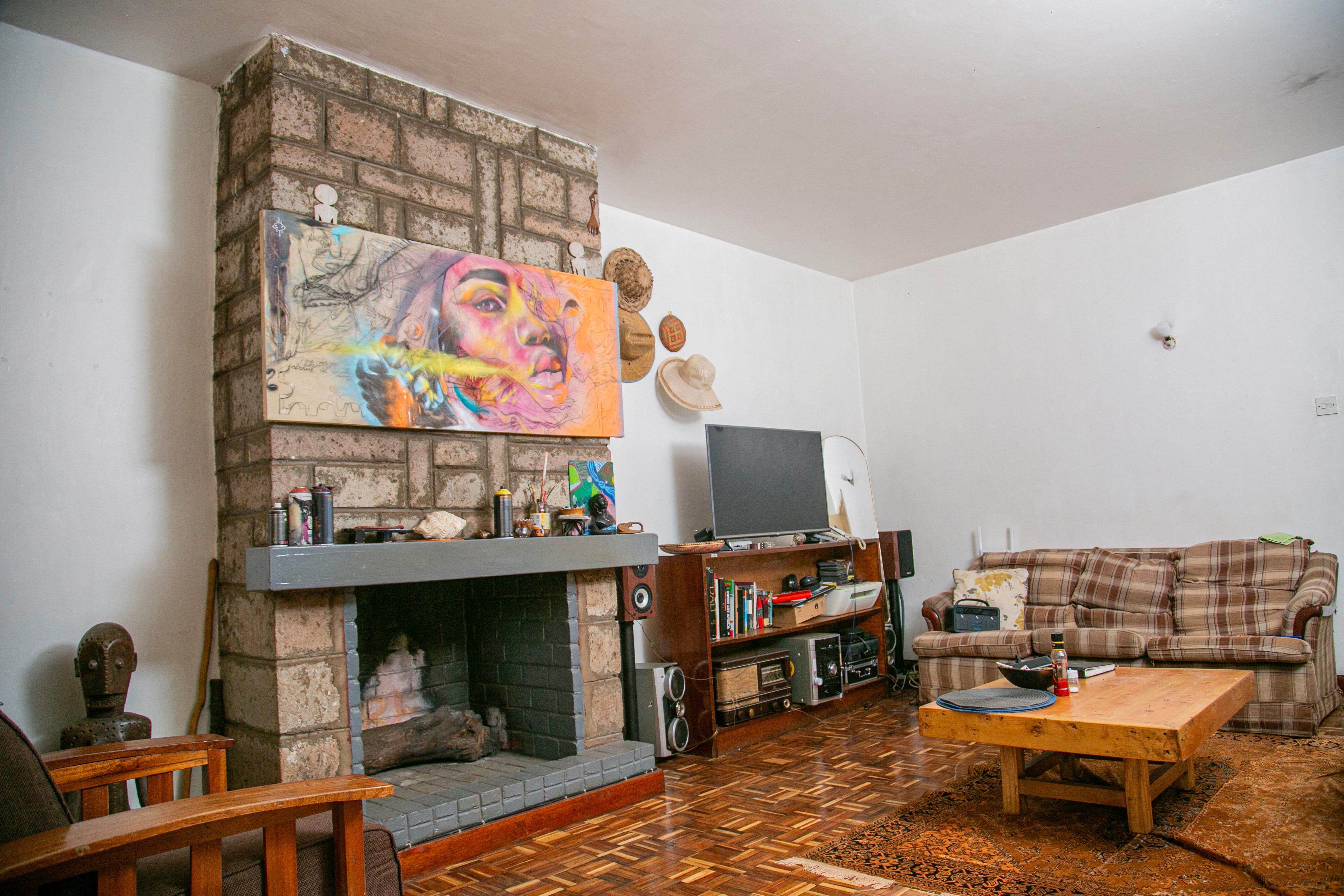 Spacious lounge with chimney fireplace