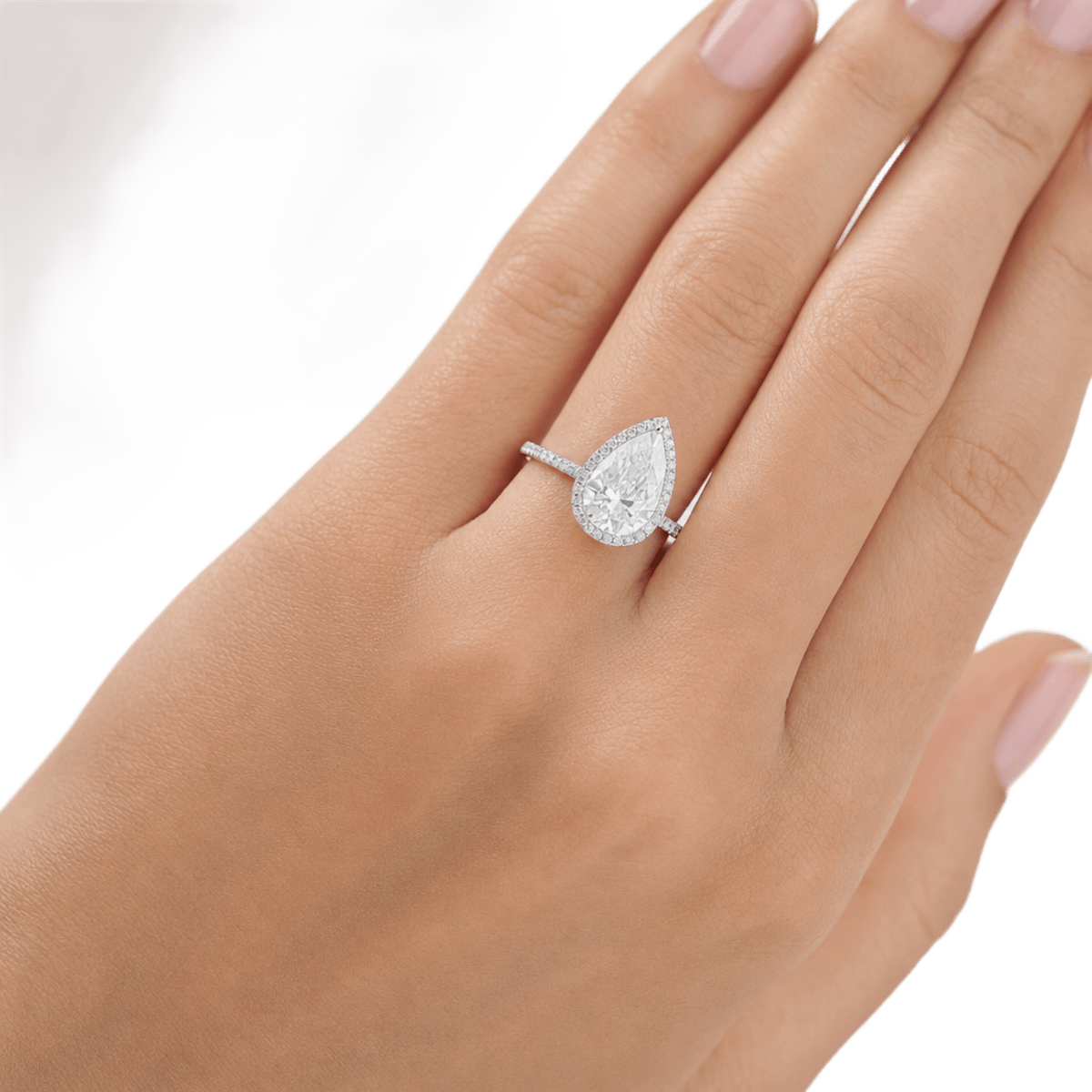 Platinum Halo Pear Shaped Engagement Ring — lifestyle