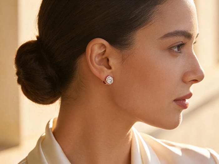 Soleil Rosé Studs worn on ear — lifestyle portrait