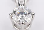 Diamond Solitaire Pendant — four prong macro close-up