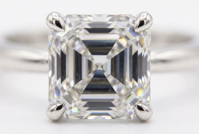 Asscher Cut Solitaire Ring — macro close-up of step-cut windmill facets