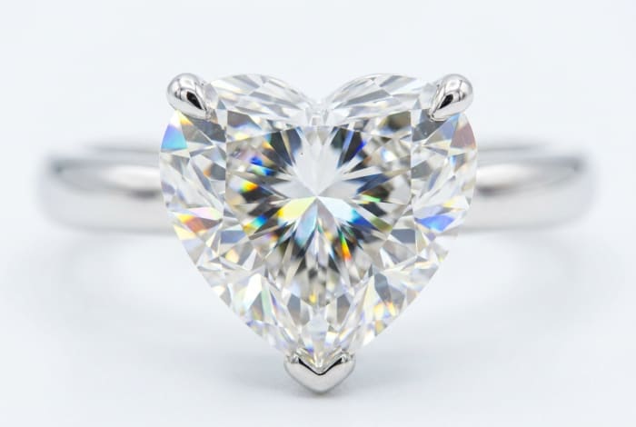 Heart Shape Diamond Solitaire Ring — macro close-up of heart cut facets