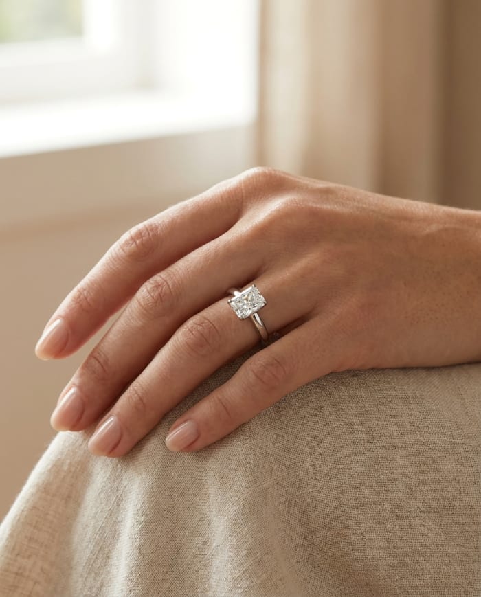 Radiant Cut Diamond Solitaire Ring worn on hand — lifestyle