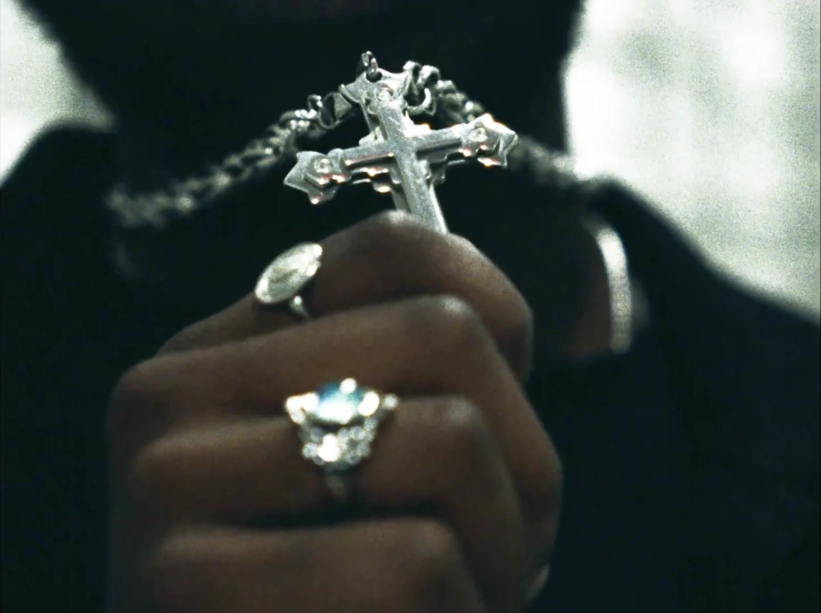 Jewellery and a silver cross in the cover for DOUBLE
