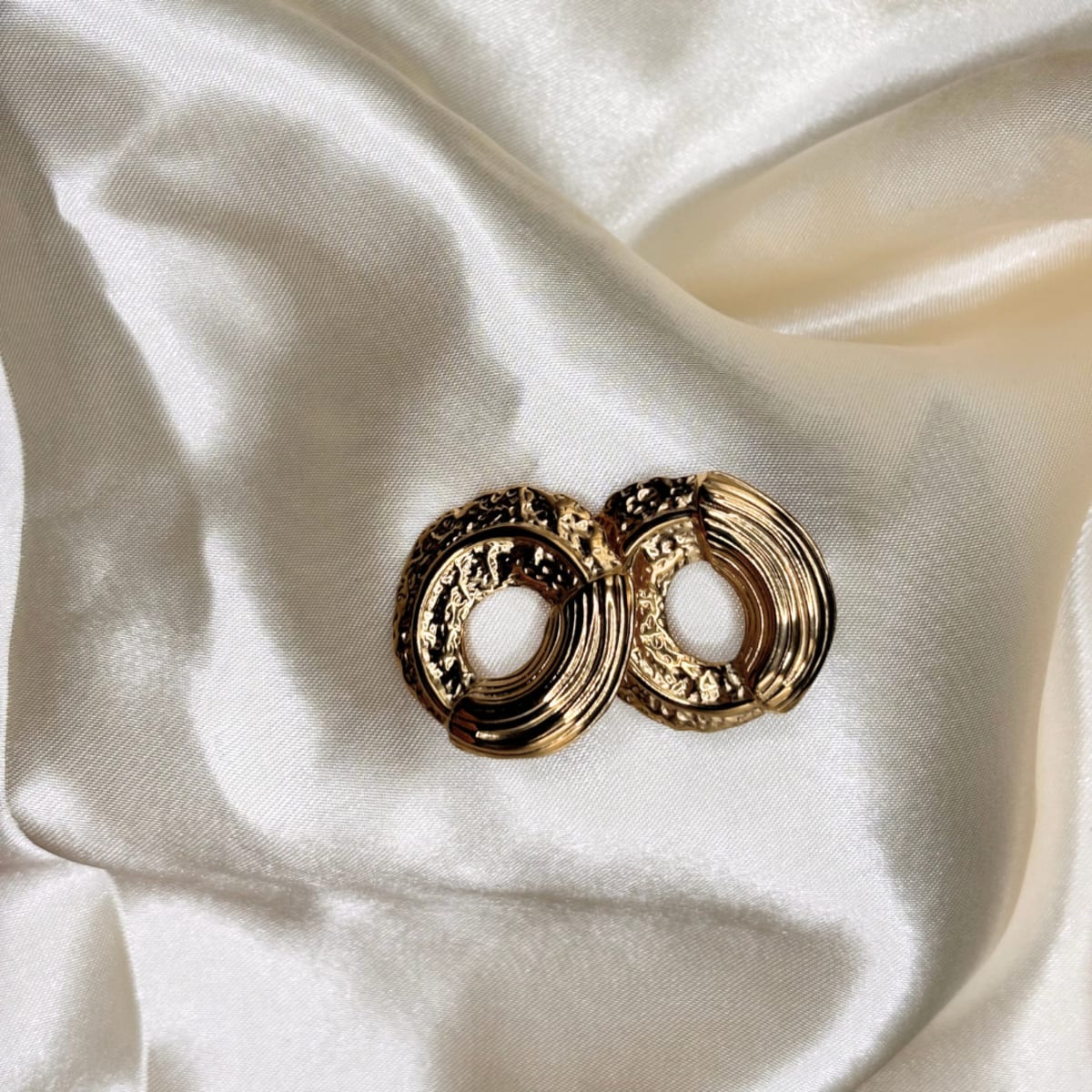 Boucle d’oreille Esso