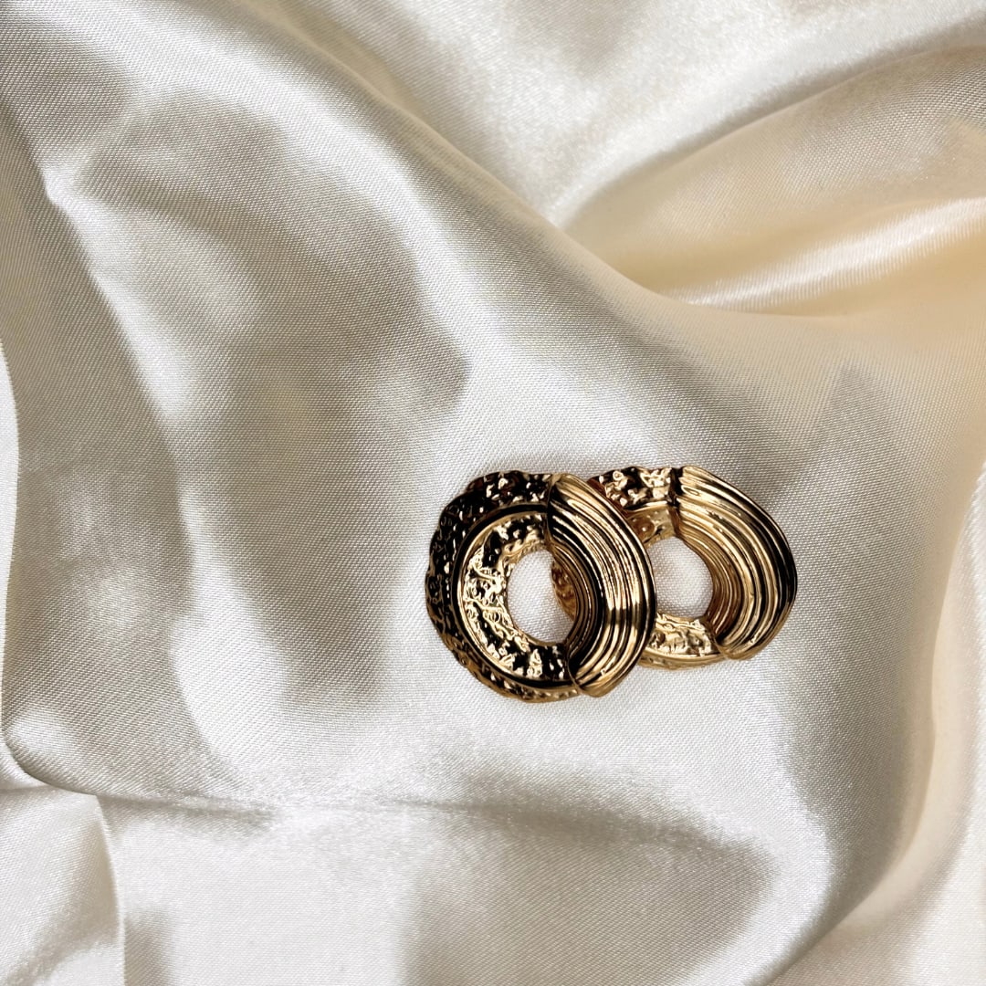 Boucle d’oreille Esso