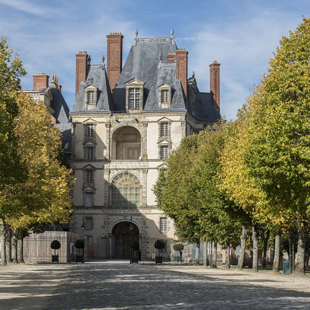 Aerial view of Chateau de Fontainebleau with its gardens, a UNESCO