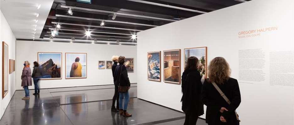 People attending a photo exhibition at the Henri Cartier Bresson Foundation