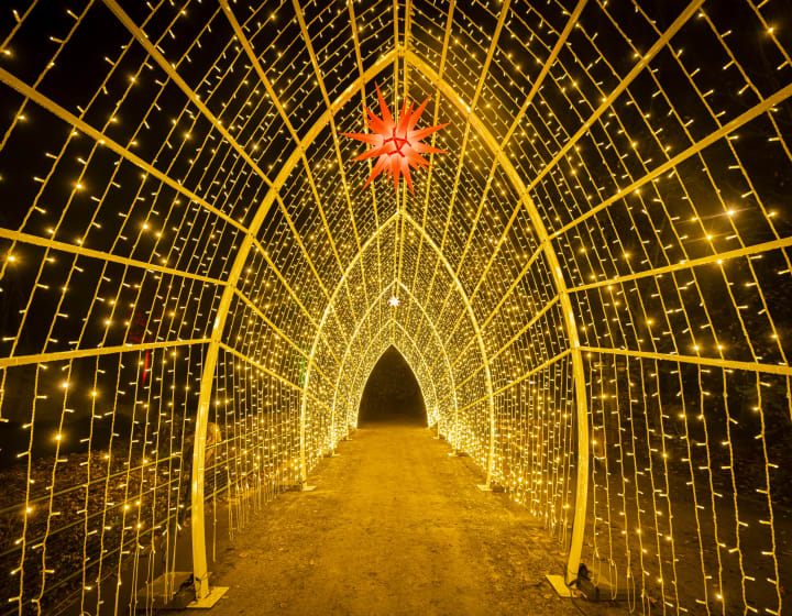 Golden arch of light on the Lumières en Seine route