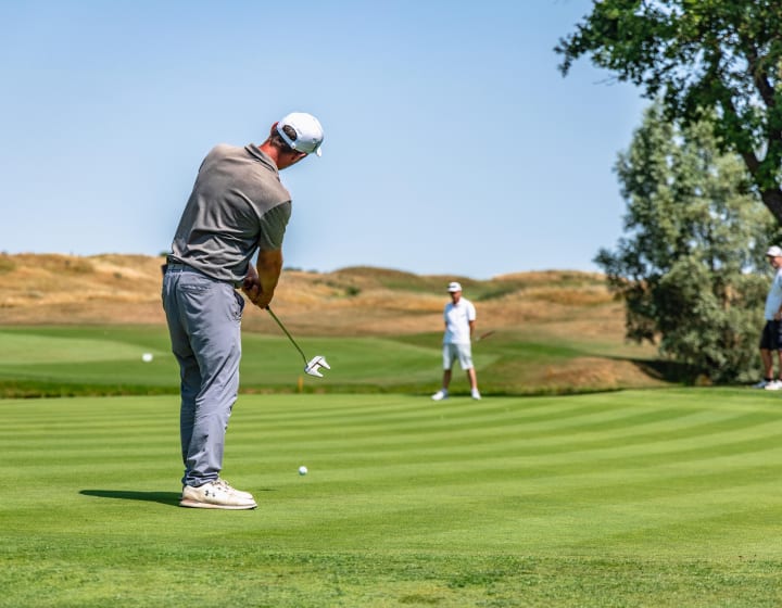 Golf players on a course in the Yvelines
