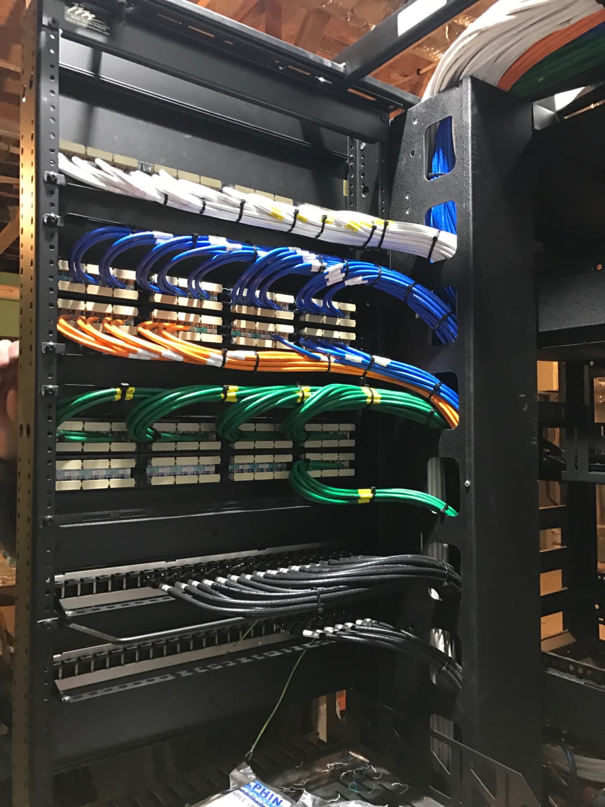 Organized residential AV equipment and technology infrastructure for a Hamptons home